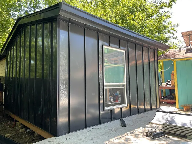 Black standing seam metal wall panels for Metal Roof Installation in Piedmont